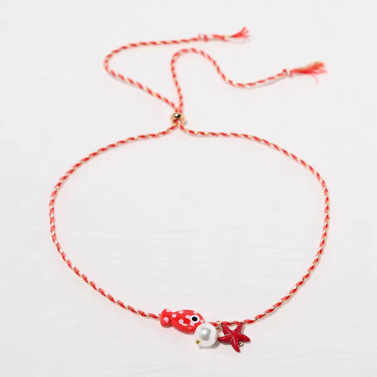 BABY FISH NECKLACES